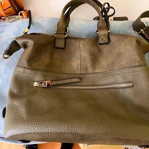 Handbag army green adjustable strap fits underneath bag if not worn see pic.
